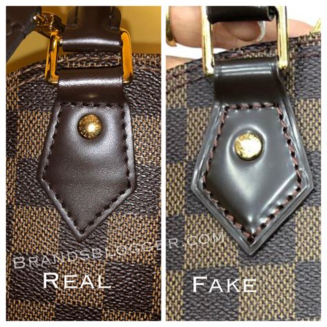 real vs fake louis vuitton alma bag|Louis Vuitton authenticity check.